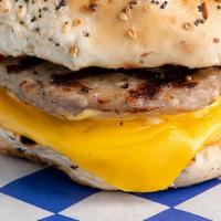 Breakfast Sausage Bagel  · Two farm fresh eggs served with potatoes or tomatoes, toast, bagel or English muffin.