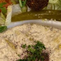 Baba Ghanoush Plate · Vegetarian. A delightful dip of charbroiled eggplants served with salad and pita bread.