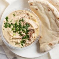Hummus · Traditional chickpea dip.