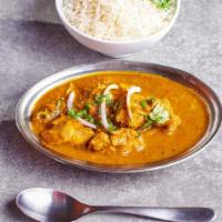 Chicken Curry · Gluten-Free, Lactose-Free. Tender chicken cooked with onions, garlic, tomatoes & Nepali spic...