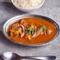 Lamb Curry · Gluten-Free, Lactose-Free.  Meat & vegetables cooked in onions,  tomatoes & spices.