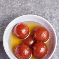 Gulab Jamun(2pcs) · Vegetarian. Fried dried milk balls soaked in rose flavored sugar syrup.