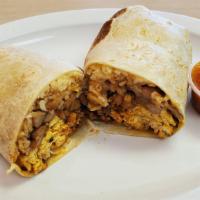 Breakfast Burrito · Burrito  wrapped inside a flour tortilla breakfast  include scrambled eggs, potatoes, choriz...