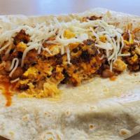 Huevo con Chorizo · Scrambled eggs with chorizo (spiced Mexican pork sausage) served with rice, beans and cheese...