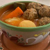Albondigas(Meatball soup) · Meatball soup loaded with vegetables, fresh herbs,    seasoned tomato broth along with potat...