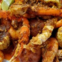 Boiling Crab · Shrimp,  crab leg, potatoes, corn, bread , marinated with house salsa  .