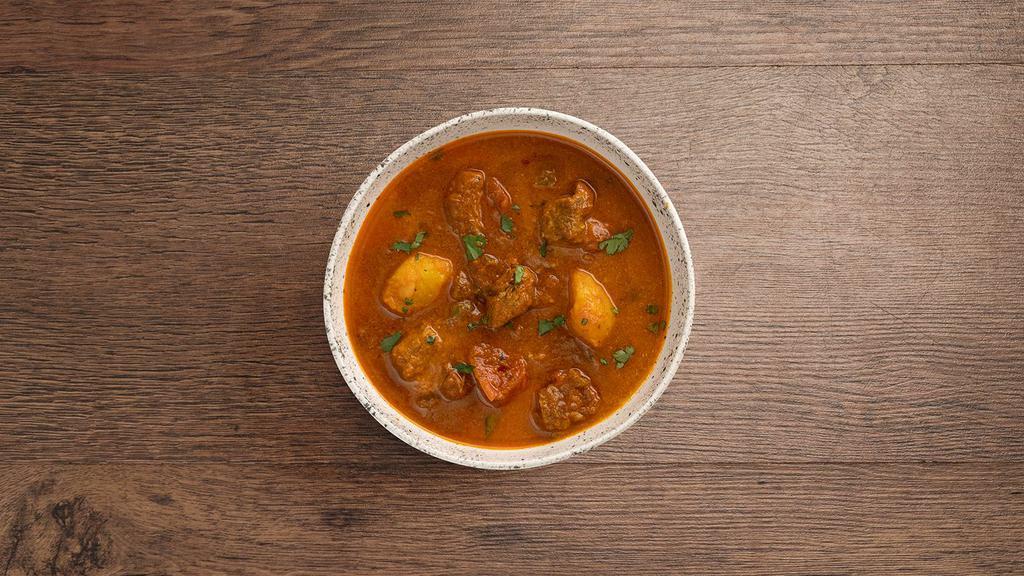 Lamb Vindaloo · Lamb and potatoes cooked in a spicy hot curry.