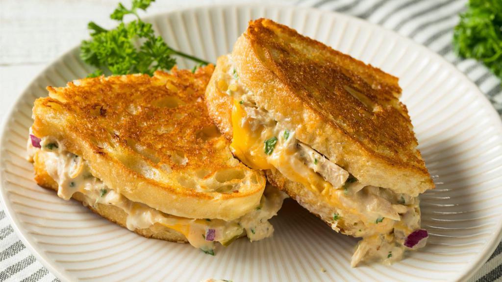 Tuna Melt · Fresh, homemade tuna salad, melty provolone cheese between buttery, browned, grilled toast.