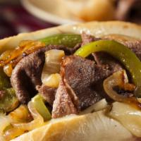 Classic Philly Cheesesteak · Juicy, chopped steak with grilled peppers and onions, melty provolone cheese and mayo on a s...