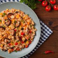 Jambalaya · A flavor bomb. Traditional dish of rice slow cooked with onions, celery, bell pepper and ric...