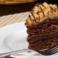 German Chocolate Cake · Moist chocolate cake filled and topped with a creamy, coconut and pecan frosting.