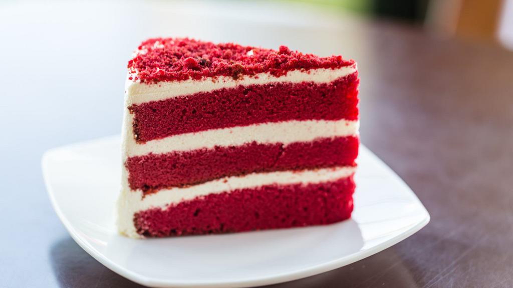 Red Velvet Cake · Traditional, moist, red velvet cake with a hint of cocoa and a classic white frosting.