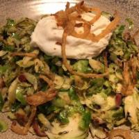 Warm Shaved Brussels Sprouts · Poached egg, bacon, crispy shallots, bacon vinaigrette.