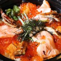 Deluxe Meshi (Large) · Seared salmon sashimi, eel, salmon roe, and poached egg served on crunchy skillet rice. (Ser...