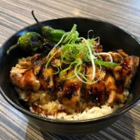 Chicken Teriyaki Don · Grilled skinless chicken thighs with teriyaki glaze over rice.