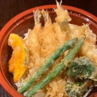 Tempura Don · Shrimp and veggie tempura with original sauce over rice.
