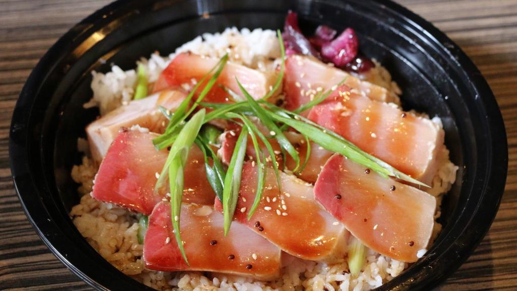 Hamachi Tataki Don · Seared yellowtail sashimi over rice topped with wasabi and ponzu sauce.