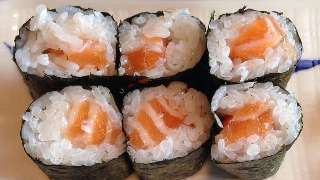 Salmon Shioyaki Bento · Grilled salmon fillet over rice, fried boneless chicken, sashimi, and edamame. (no substitution)