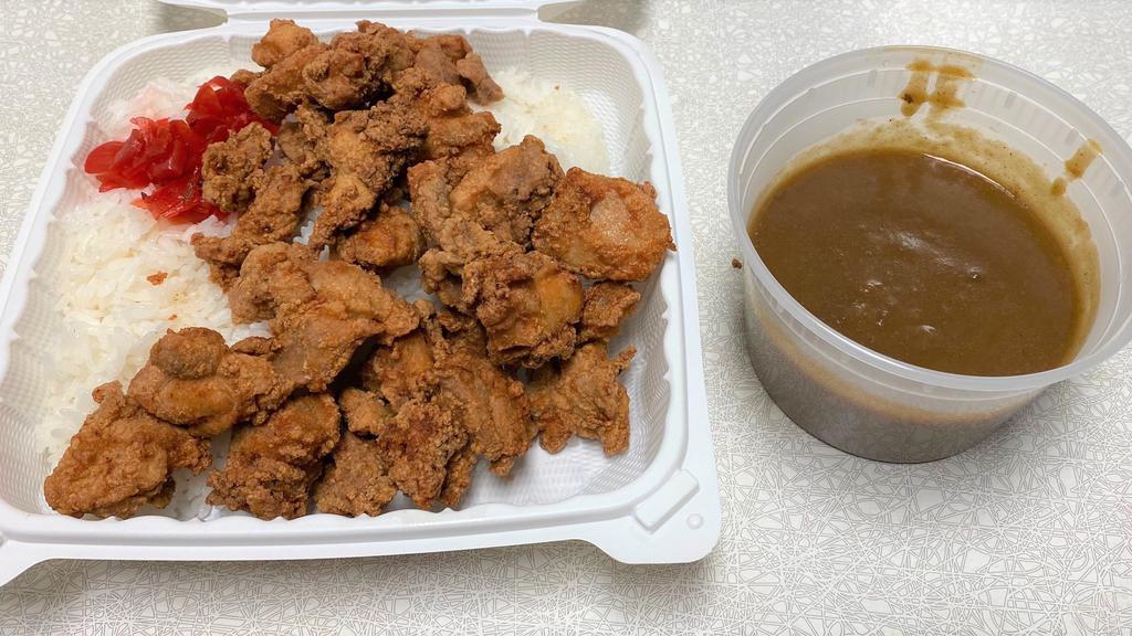 Chicken Karaage Curry Rice · Fried boneless chicken with curry over rice. (curry sauce is separated.)