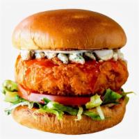 Spicy Buffalo Fried Chicken Sandwich · Fried chicken served on a toasted bun and topped with lettuce, tomato, blue cheese crumbles,...