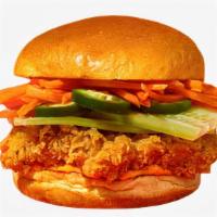 Vietnamese Fried Chicken Sandwich · Fried chicken served on a toasted bun and topped with shredded carrot slaw, cilantro, jalape...