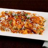 Vegetarian Biryani · Vegan. Mixed vegetables cooked with basmati rice and special blend of spices.