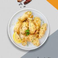 Great Garlic Parmesan Wings · Fresh chicken wings breaded, fried until golden brown, and tossed in garlic and parmesan.