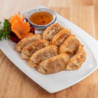 Pot Sticker · Pan fried stuff with mix vegetables serve with spicy sauce