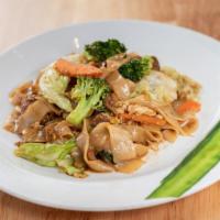 Pad See-Ew · Pan-fried flat rice noodles with garlic, cabbage, broccoli, carrot, cauliflower and egg.