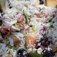 Fatoush Salad · Romaine lettuce, cucumber, tomato, kalamata olives, mint & cilantro, red onions, toasted pit...