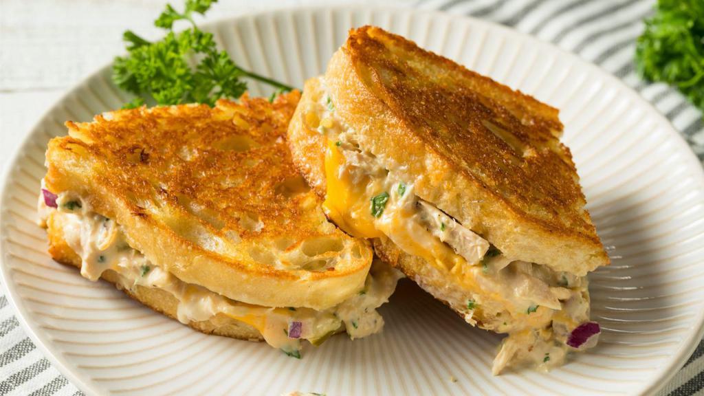 Tuna Melt Half Sandwich Combo · Exquisite tuna melt sandwich made to perfection. Served with customer's choice of side.