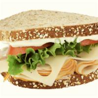 Turkey & Swiss Half Sandwich Combo · Turkey breast with swiss cheese, cranberry sauce, red onions, tomatoes, and sprouts. Served ...