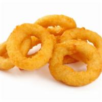 Onion Rings · Golden battered onion rings.