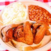 3 Piece Wing Plate · 3 Wings.  Includes Baked Beans and Cole Slaw.