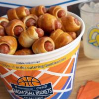 Mini Dogs Free Throw Bucket · One Limited Edition Basketball Bucket filled with Mini Pretzel Dogs and 2 medium (21 oz.) dr...