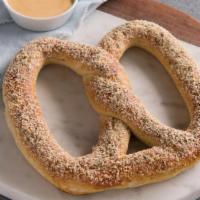 Roasted Garlic Pretzel · The aroma of garlic and fresh parmesan makes this savory treat the best thing since sliced g...