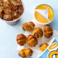 Mini Pretzel Dogs Bundle · Mini pretzel dogs, choice of dip, and choice of medium soft drink.