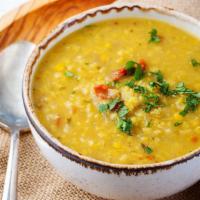 Daal · Yellow lentil cooked with ginger, garlic and spices.