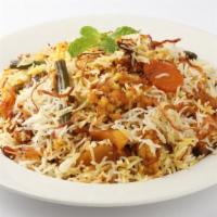 Vegetable Dum Biryani · Aged basmati rice cooked in spices and combination of seasonal vegetables.