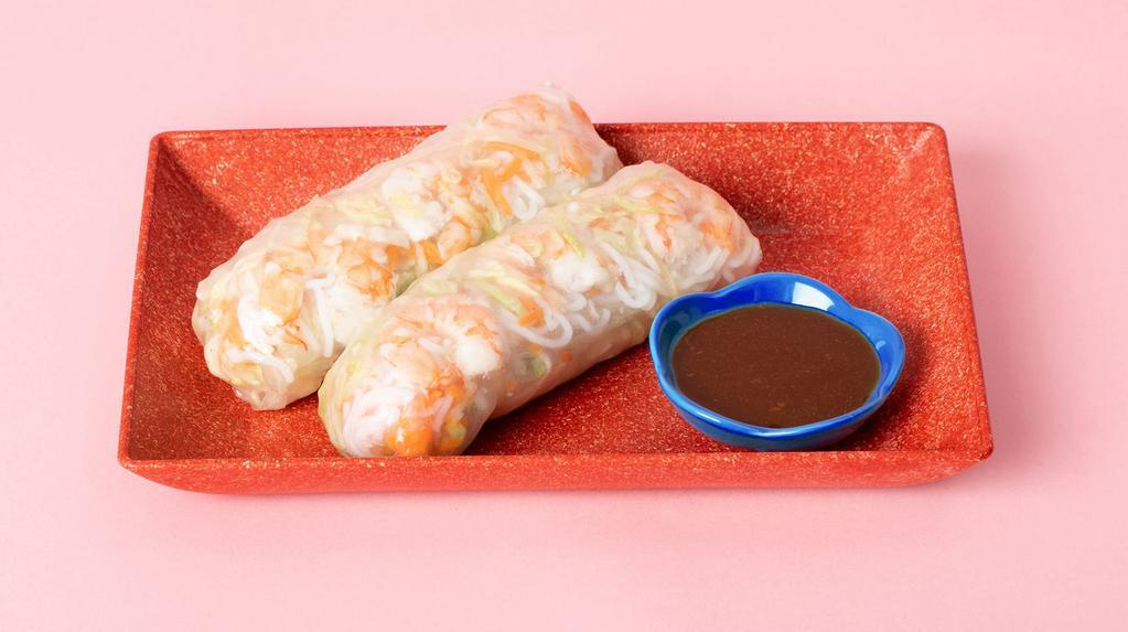 Shrimp Spring Rolls (2) · Shrimp and mixed vegetables wrapped in rice paper with dipping sauce.