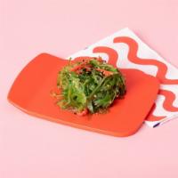 Seaweed Salad · Sea it to believe it. Seaweed salad sprinkled with sesame seeds tossed in a soy vinaigrette.