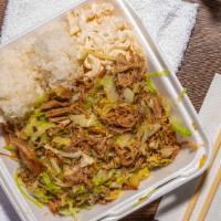 Kalua Pork With Cabbage · Slow roasted, shredded and smoked pork combined with cooked cabbage.