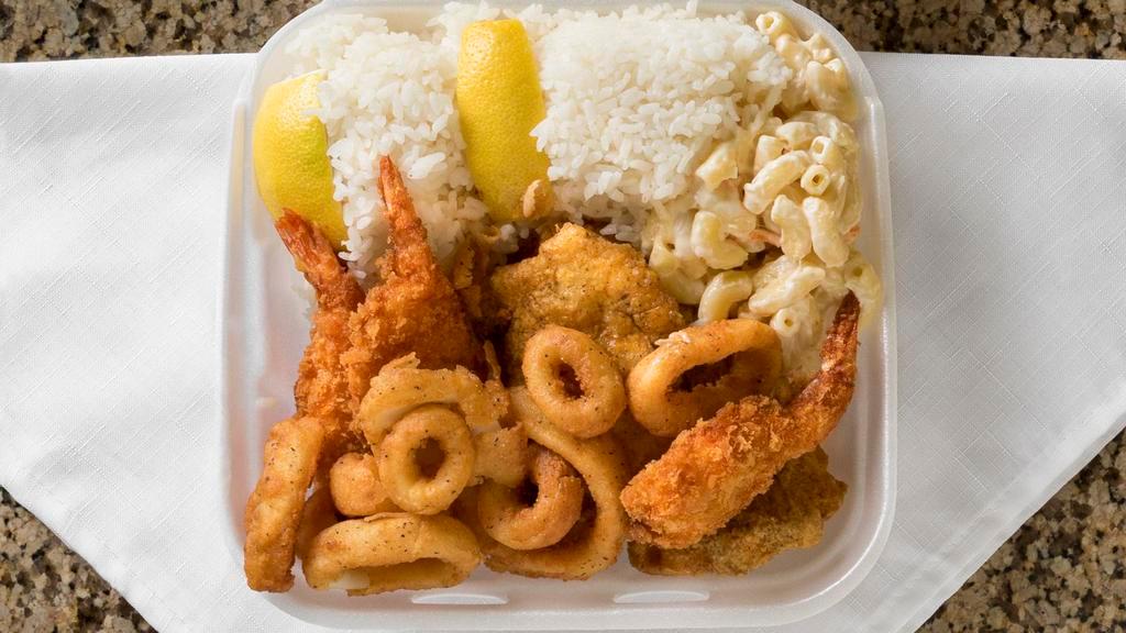 Seafood Combo · Mahi Mahi, fried shrimp, and your choice of teri steak, BBQ chicken, or BBQ short ribs. Includes 2 scoops of rice and 1 scoop of macaroni salad.