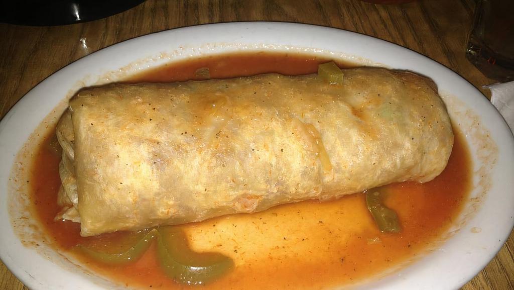 Burritos Grandes (Shrimp) · Large flour tortilla, stuffed with rice, beans & shrimp. Served wet, topped with our delicious house sauces. Add guac, cheese, and sour cream for additional cost.