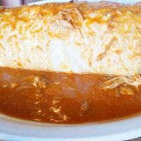 Burritos Grandes (Meat) · Large flour tortilla, stuffed with rice, beans & meat. Served wet, topped with our delicious...