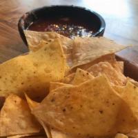 Chips and Salsa · Puerto daily fried chips and choice of red or green salsa.