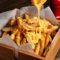 Cheese Fries · Our Homemade Crispy Fries drizzled with Yummy Cheese Sauce