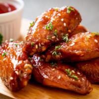 Bone-In Wings · Fresh Crispy Chicken Wings served with your choice of Sauce. Comes with Carrot and Celery