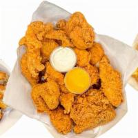 Chicken & Tenders Feast · It Includes Fresh 12pc Crispy Chicken Mix, 6pc Cajun Tenders, 6 Biscuits, and Family Fries