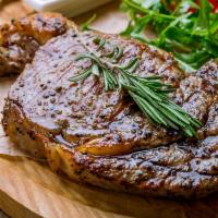 Ribeye Steak · Grilled Ribeye Steak Marinated with Garlic, Rosemary, Sage, Olive Oil, Salt Pepper served wi...
